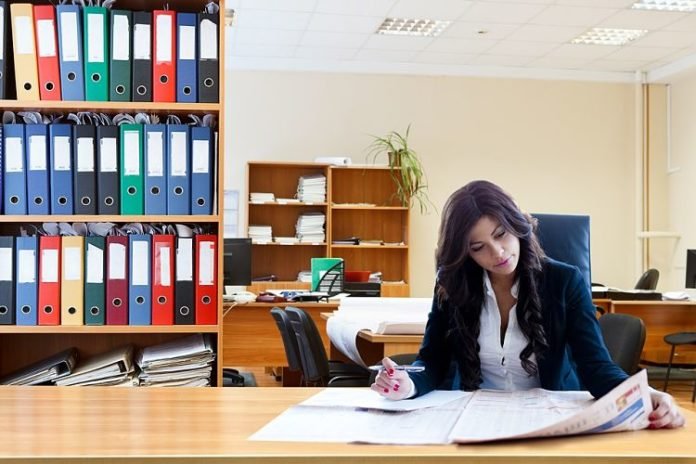 business woman reading