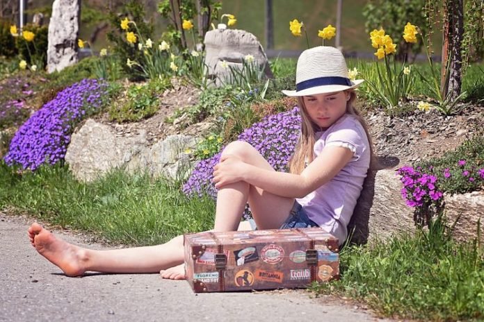 girl sitting alone