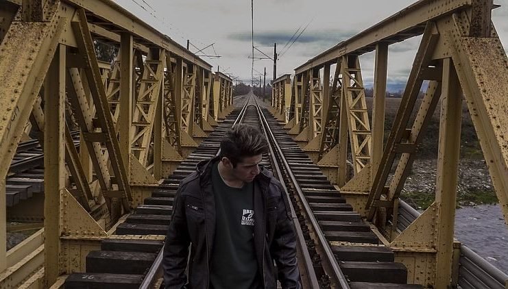 men on bridge